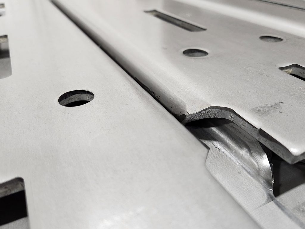 close up view of heavy gauge stamping